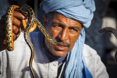 Snake charmer, Djemaa el-Fna Square, The Medina, Marrakesh, Morocco photo