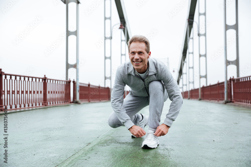 Elderly Runner prepare on bridge Elderly Runner prepare on bridge