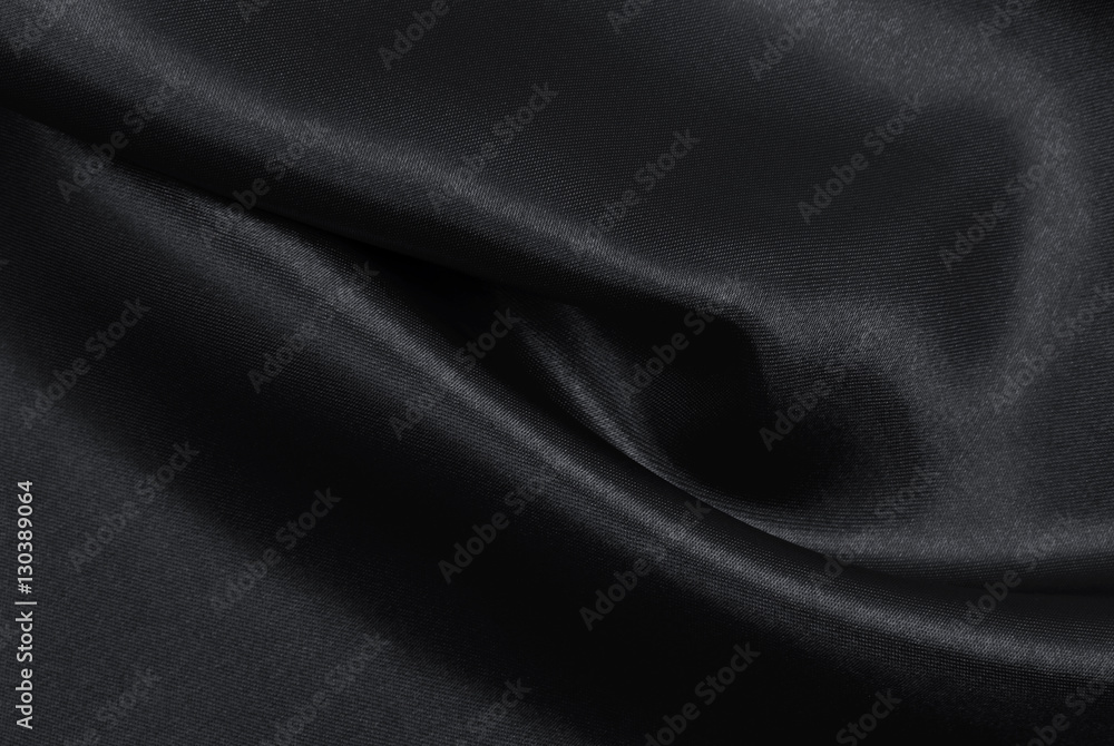 Fototapeta premium Smooth elegant dark grey silk or satin texture as abstract backg