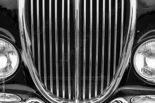 Vintage car detail with black color - chrome grille