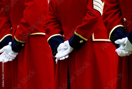 Details of traditional red coat uniforms of Chelsea Pensioners photo