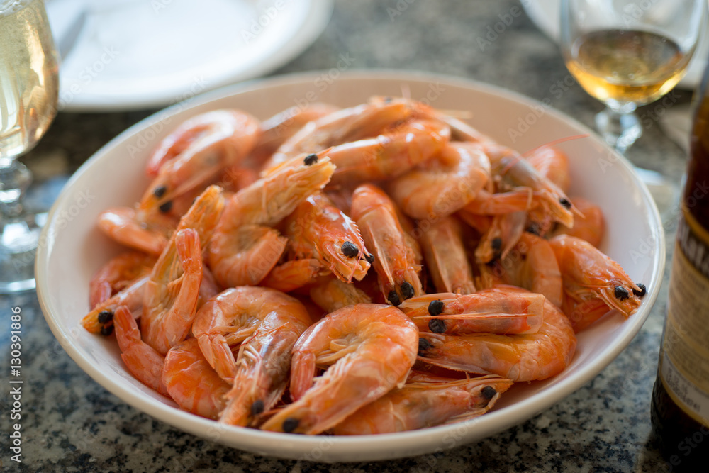 Royal shrimps lie on a plate Royal shrimps lie on a plate
