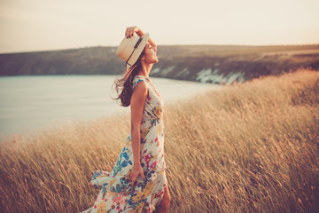 Modern girl in light summer dress