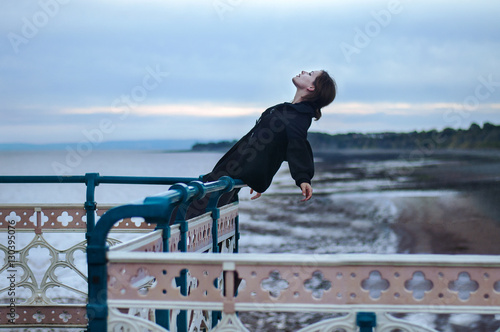woman relaxing on pier-ceiling 