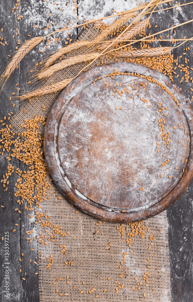 Fototapeta premium Bread bakery background, grain and wheat ears