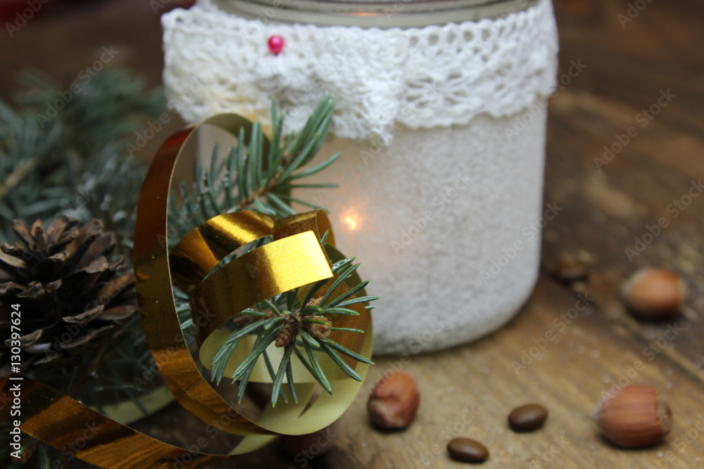 Fototapeta premium Christmas tree next to the New Year's torch