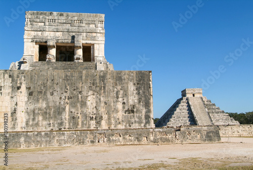 Mayan pyramid of Jaguares and El Castillo in Chichen Itza photo