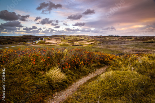 Fototapeta Naklejka Na Ścianę i Meble -  Stormy Sunrise in the Dunes of Katwijk