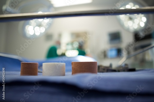 Three bandage reel on surgical tray in operation theater