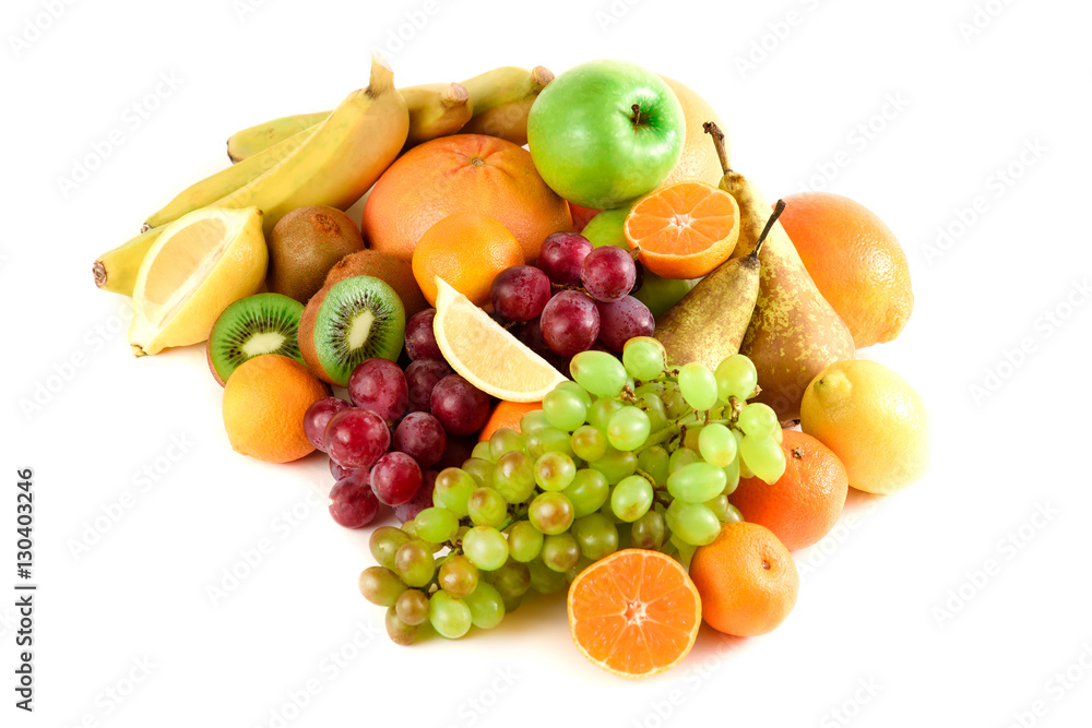 Many colorful, bright, fresh fruit on a white background. Kiwi, grapefruits, bananas, grapes, lemon, mandarins, oranges, pear. Many colorful, bright, fresh fruit on a white background. Kiwi, grapefruits, bananas, grapes, lemon, mandarins, oranges, pear.