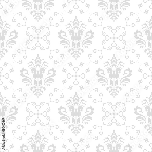 Damask vector classic light silver pattern. Seamless abstract background with repeating elements. Orient background © Fine Art Studio