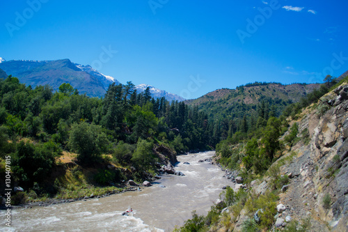 Landscape with a river and hills. Panoramic view of "Cascada de las Animas" in Chile