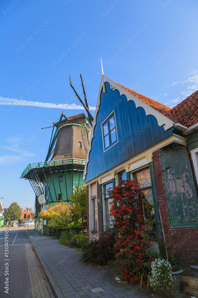 Historic Dutch windmill in The Netherlands cityscape