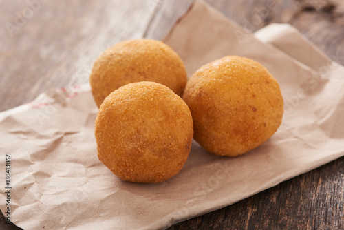 Arancini  deep fried rice balls with meat  Typical Sicilian street food