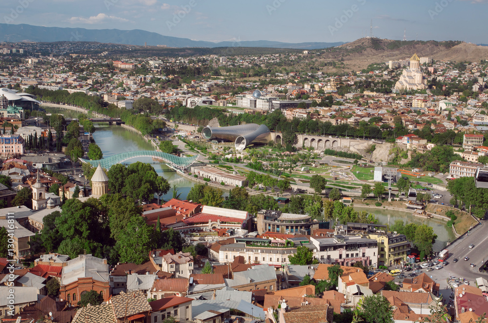 Tbilisi city view from hill. Cityscape with historical buildings and river Kura, Georgia country