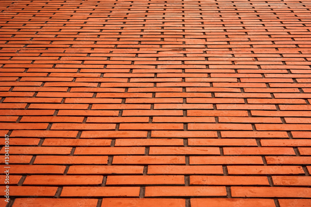 Red brick wall texture close-up background in perspective Red brick wall texture close-up background in perspective
