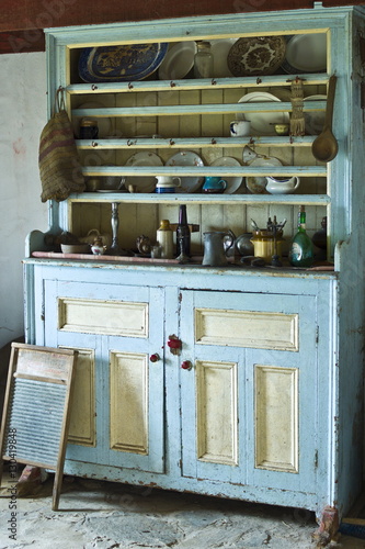 Dresser in historic cottage of Dan O'Hara, evicted by the British and forced to emigrate, Connemara, County Galway, Ireland photo
