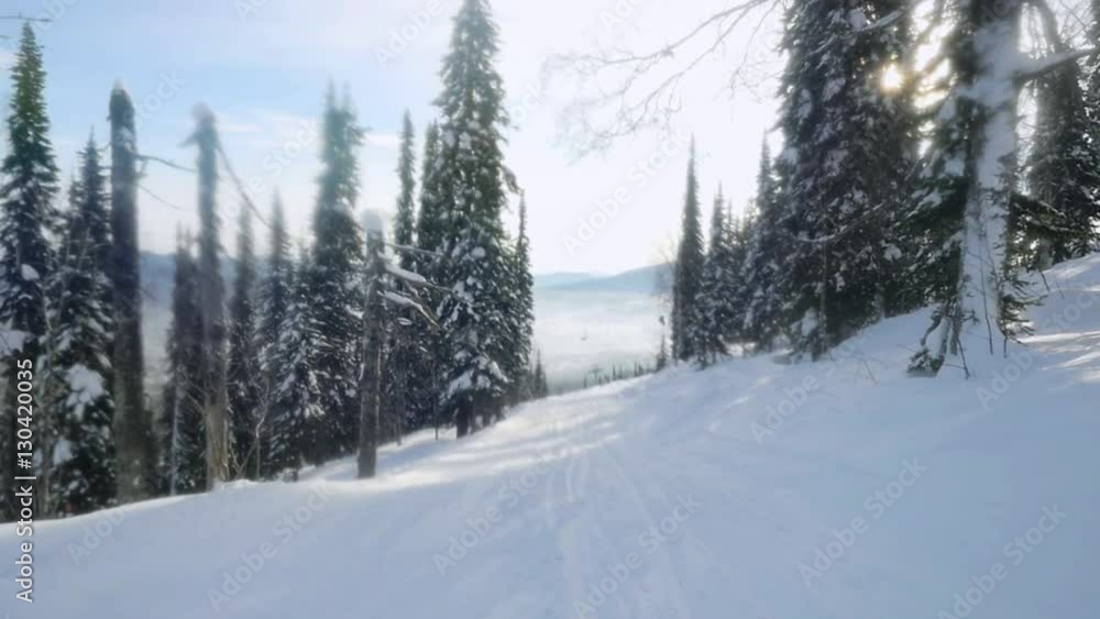 Amazing mountains in Sheregesh covered with snow, and beautiful snowy woods under bright winter sun in slow motion. 1920x1080 Amazing mountains in Sheregesh covered with snow, and beautiful snowy woods under bright winter sun in slow motion. 1920x1080
