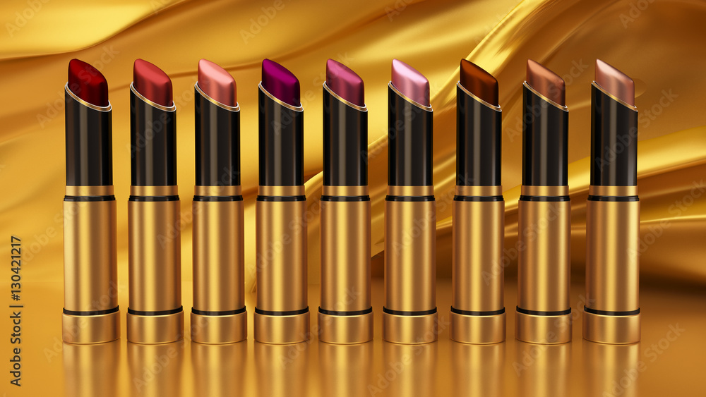 Fototapeta premium Lipstick on a background of gold, flying fabrics. The tube, bott