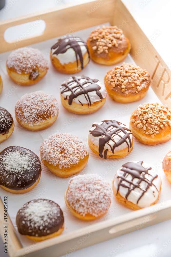 delicious Doughnuts / donuts on a tray 