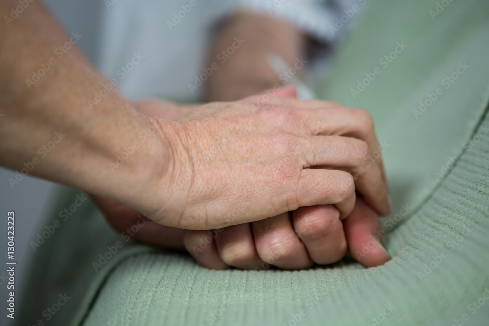 Doctor consoling a patient