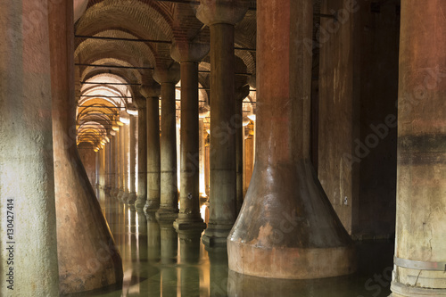 Water reflecting columns at Basilica Cistern (Sunken Palace) subterranean water system underground, Istanbul, Turkey photo