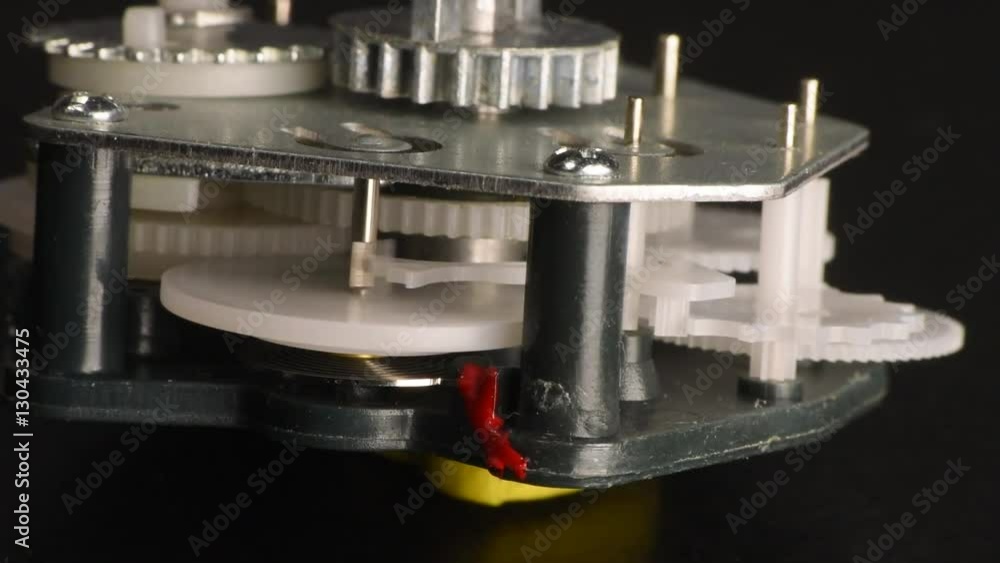 simple clockwork with plastic gears. mechanism works then stops + tick-tock sound simple clockwork with plastic gears. mechanism works then stops + tick-tock sound