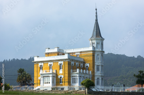 Traditional Indianos house built by wealthy owners in village of Samao in Asturias, Spain photo