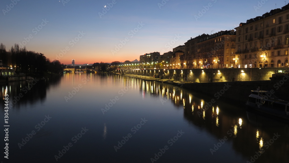 turin and the po river at sunset