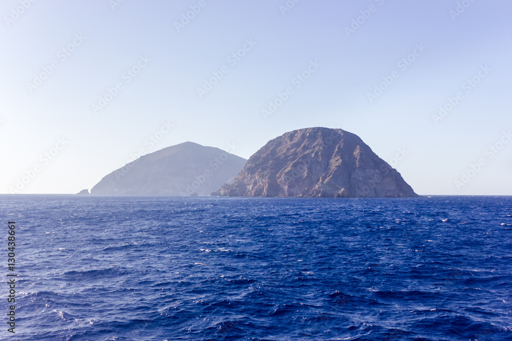 View on the rocks in the Cretan sea between Crete Island and Santorini Islands