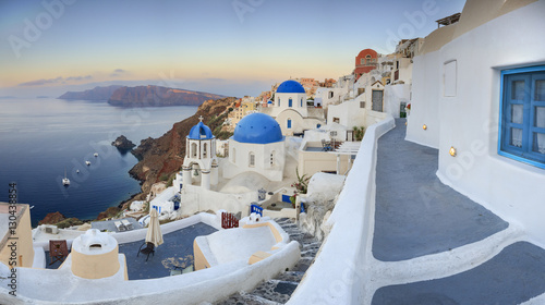 White houses and blue domes of the churches dominate the Aegean Sea, Oia, Santorini, Cyclades, Greek Islands, Greece
