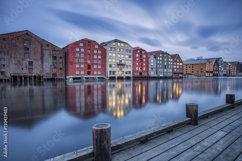 The lights of the houses reflected in the River Nidelva, Bakklandet, Trondheim photo