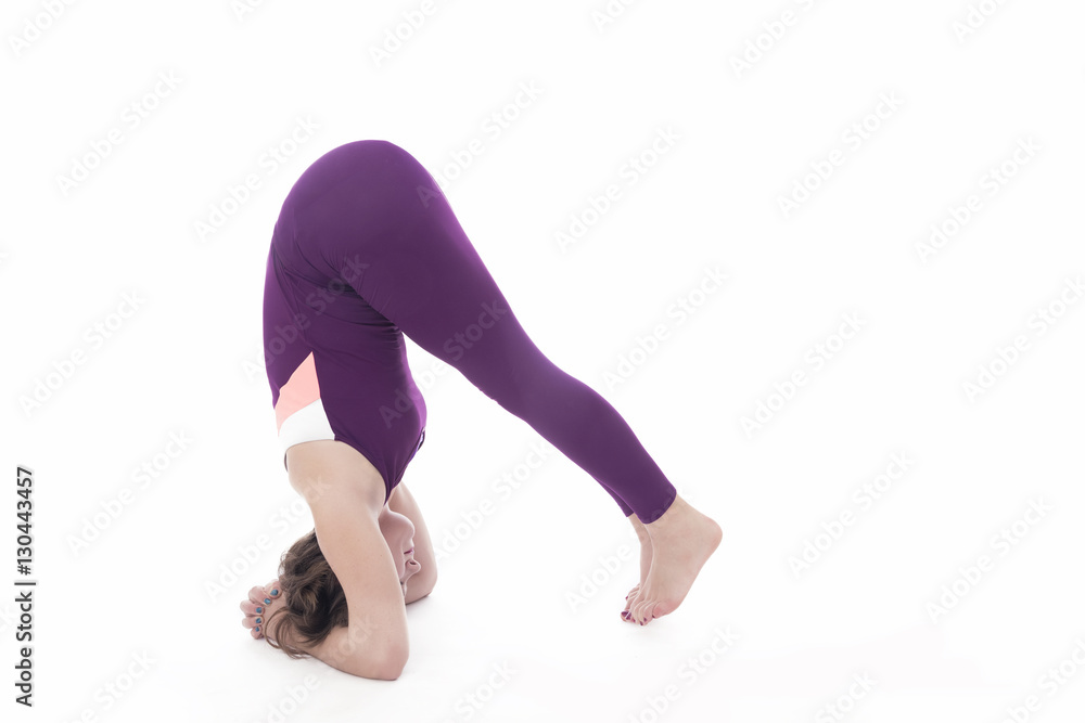 woman in yoga pose headstand -preparation isolated