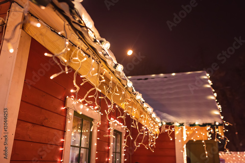 unusual christmas wreath on window.