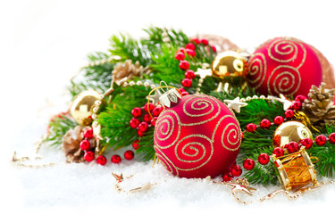 Red Christmas and New Year decorations over white background. Christmas tree