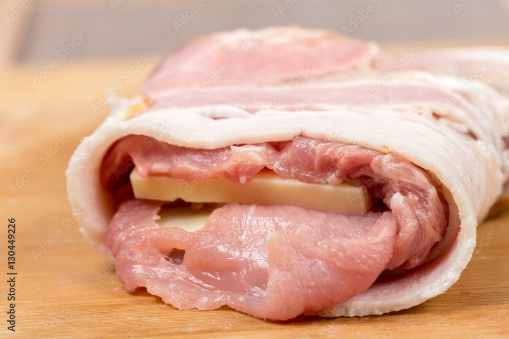 Rolled with bacon stuffed pork chop with yellow cheese Rolled with bacon stuffed pork chop with yellow cheese