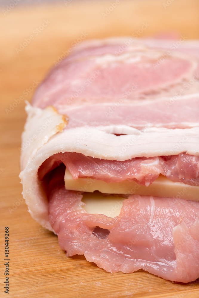 Rolled with bacon stuffed pork chop with yellow cheese Rolled with bacon stuffed pork chop with yellow cheese