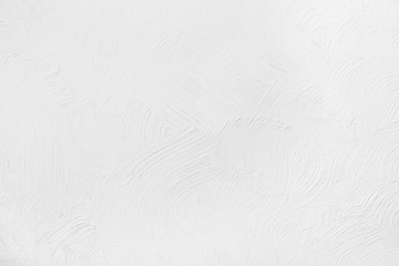 white wall with a pattern on the plaster. Texture, background