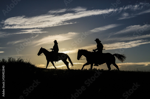 Cowboy silhoutte at sunset
