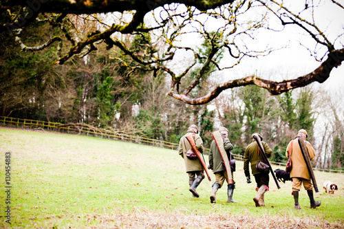Guns walking to next drive, Dorset