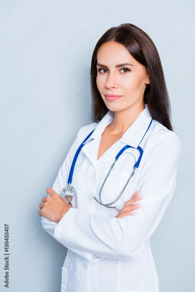 Portrait of friendly female woman with crossed hands Portrait of friendly female woman with crossed hands