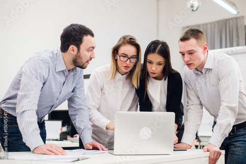 Group Of Office Workers Meeting To Discuss Ideas
