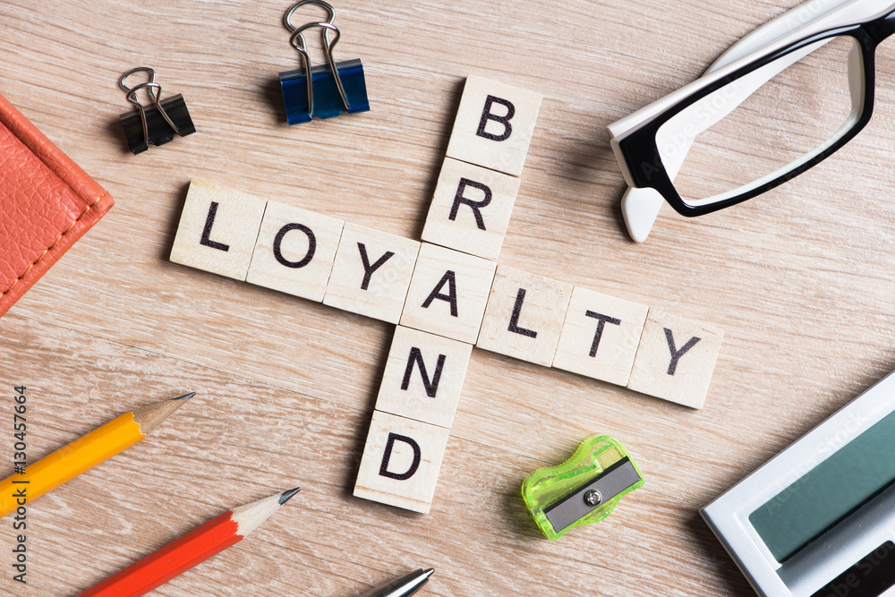 Conceptual business keywords on table with elements of game making crossword Conceptual business keywords on table with elements of game making crossword