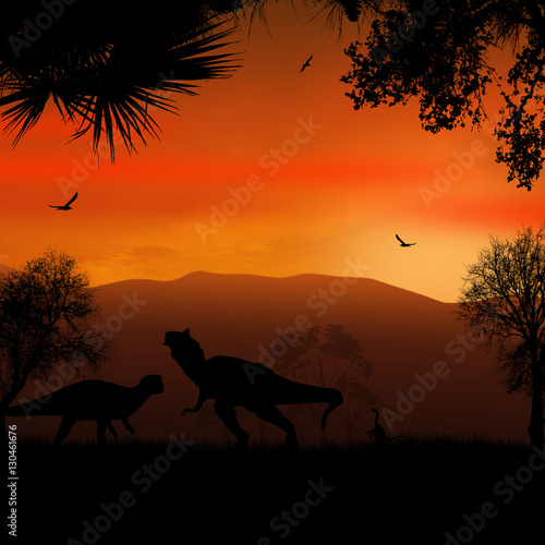 Dinosaurs silhouettes in beautiful landscape