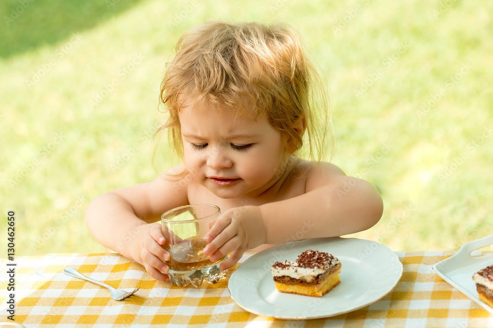 Baby boy eats dessert