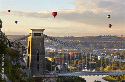Clifton Suspension Bridge, with hot air balloons in the Bristol Balloon Fiesta in August, Clifton, Bristol photo