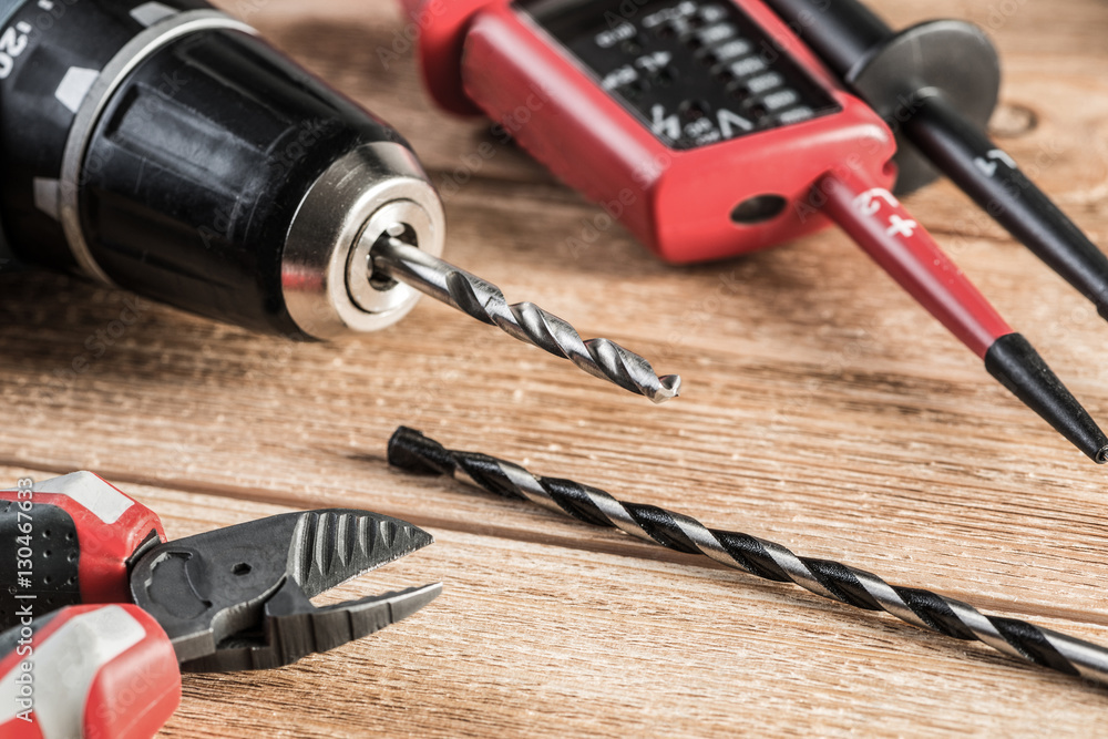 Carpentry tools on wooden surface