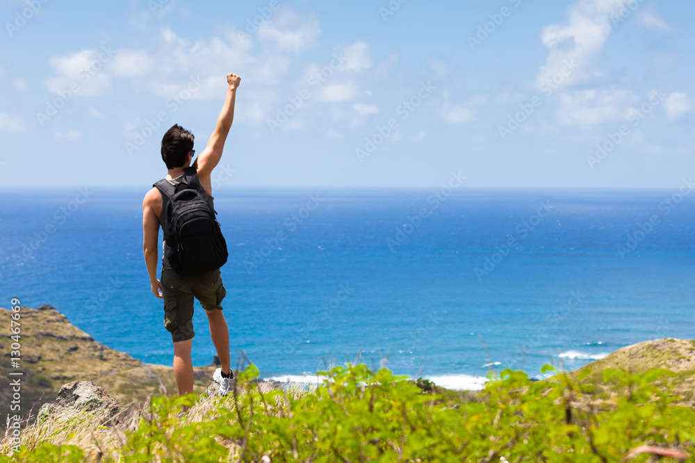 Happy active lifestyle concept. Male hiker with his fist in the air. Happy active lifestyle concept. Male hiker with his fist in the air.