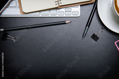 Deskoffice leather desk table with pen and pencil. Top view photo