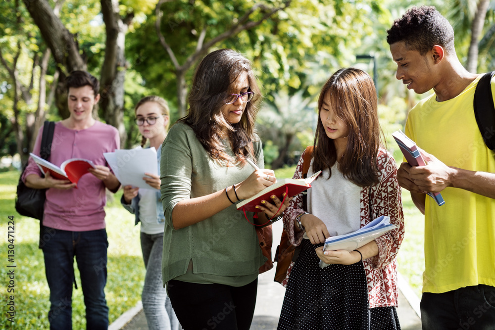 Diverse Young Students Book Outdoors Concept Diverse Young Students Book Outdoors Concept
